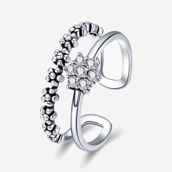 Silver Daisy Flower Adjustable Ring featuring a crystal-studded flower design and a unique beaded band.