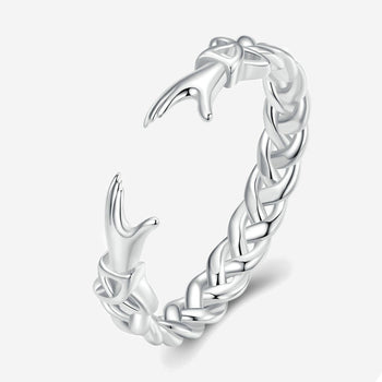 Silver Guardian Hands ring showcasing intertwined fingers design, symbolizing protection and unity.